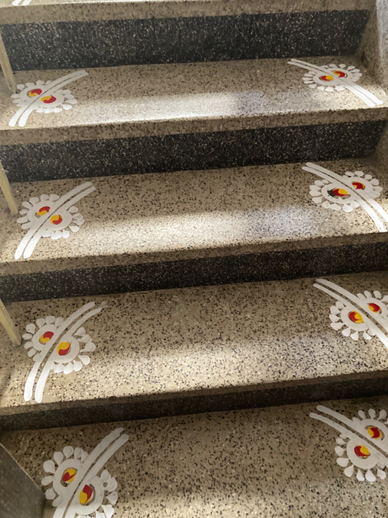 Painted flowers lining steps