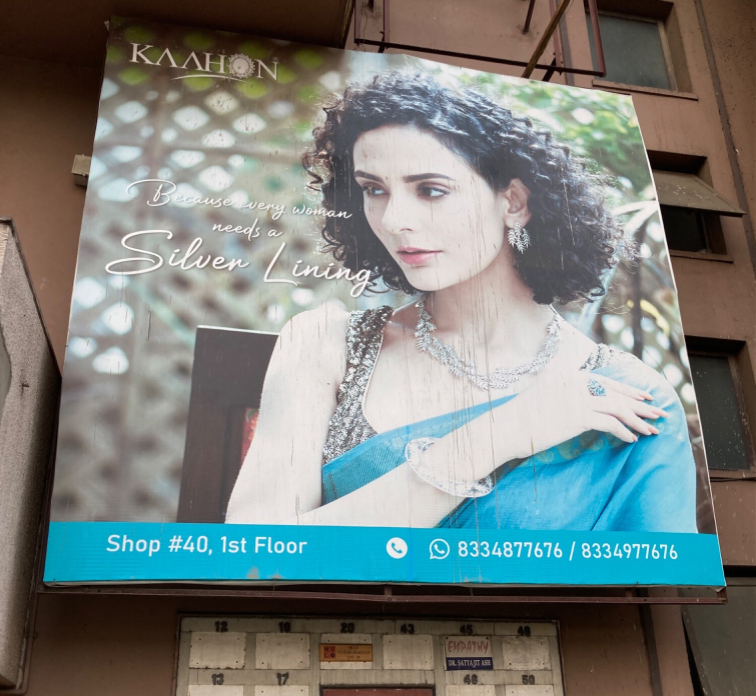 Jewelry ad featuring a bloodlessly pale brunette