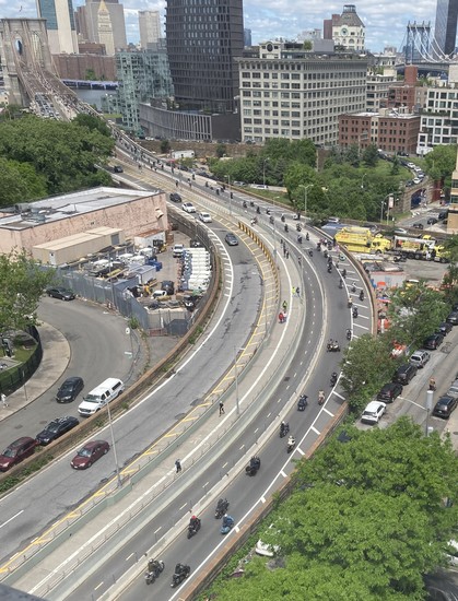 Seen from above, the Bridge viaduct with nothing but motorcycles heading to Manhattan 
