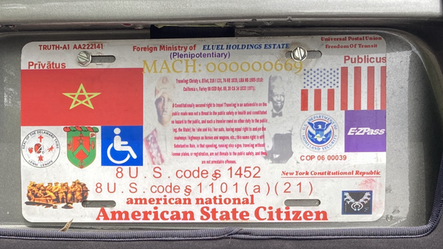 “American State Citizen” license plate with many bits of iconography involving disability, Lenni Lenape tribe, ez-pass, Department of Homeland Security, …