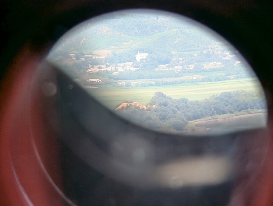 Photo of a rural village in North Korea, shot through binoculars. 