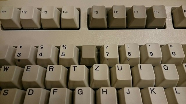 Computer keyboard closeup. Number and F-Key-section with the keycap of key '6' missing