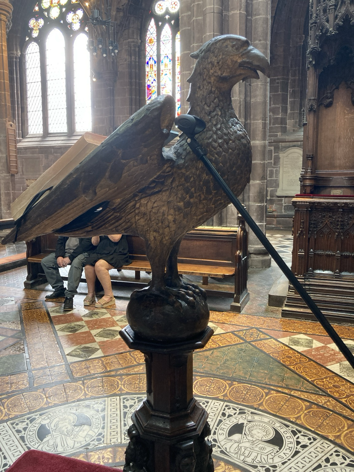 Lectern in the shape of raptor supporting a big heavy book