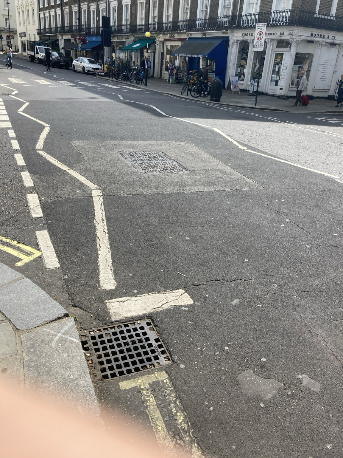 A street where the white lane lines have gone jagged
