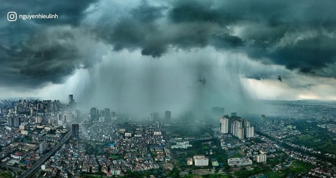 A wide angle shot of rain on Hanoi, you see an HDR world with the rain only in the middle, like it's released by the rain God 
