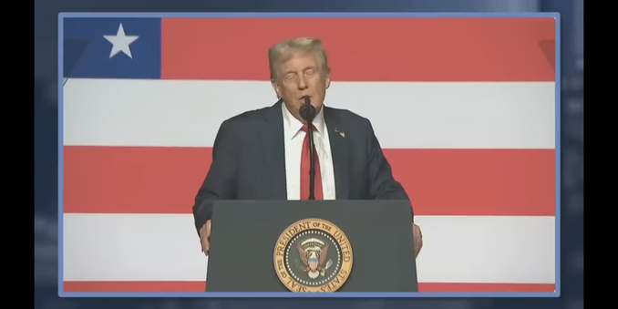 Photo of Trump with a silly face, holding a speech in front of a giant US flag, but the scene is cropped perfectly to make the flag look like the one of Liberia.