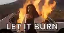 Let it burn GIF with a woman standing in front of a burning car.