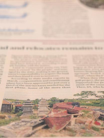 Photo from a FT.com article "Vietnam digs up its dead and relocate remains to clear site for Trump golf course". That's a revealing piece, with a snapshot of graves marked for demolition 