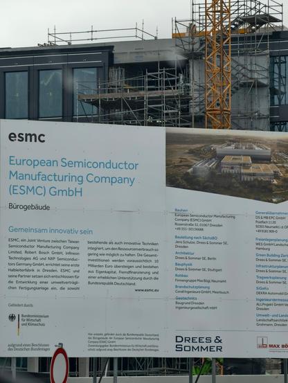 Entry sign in front of the #semiconductor fab construction, explaining the funding in goals