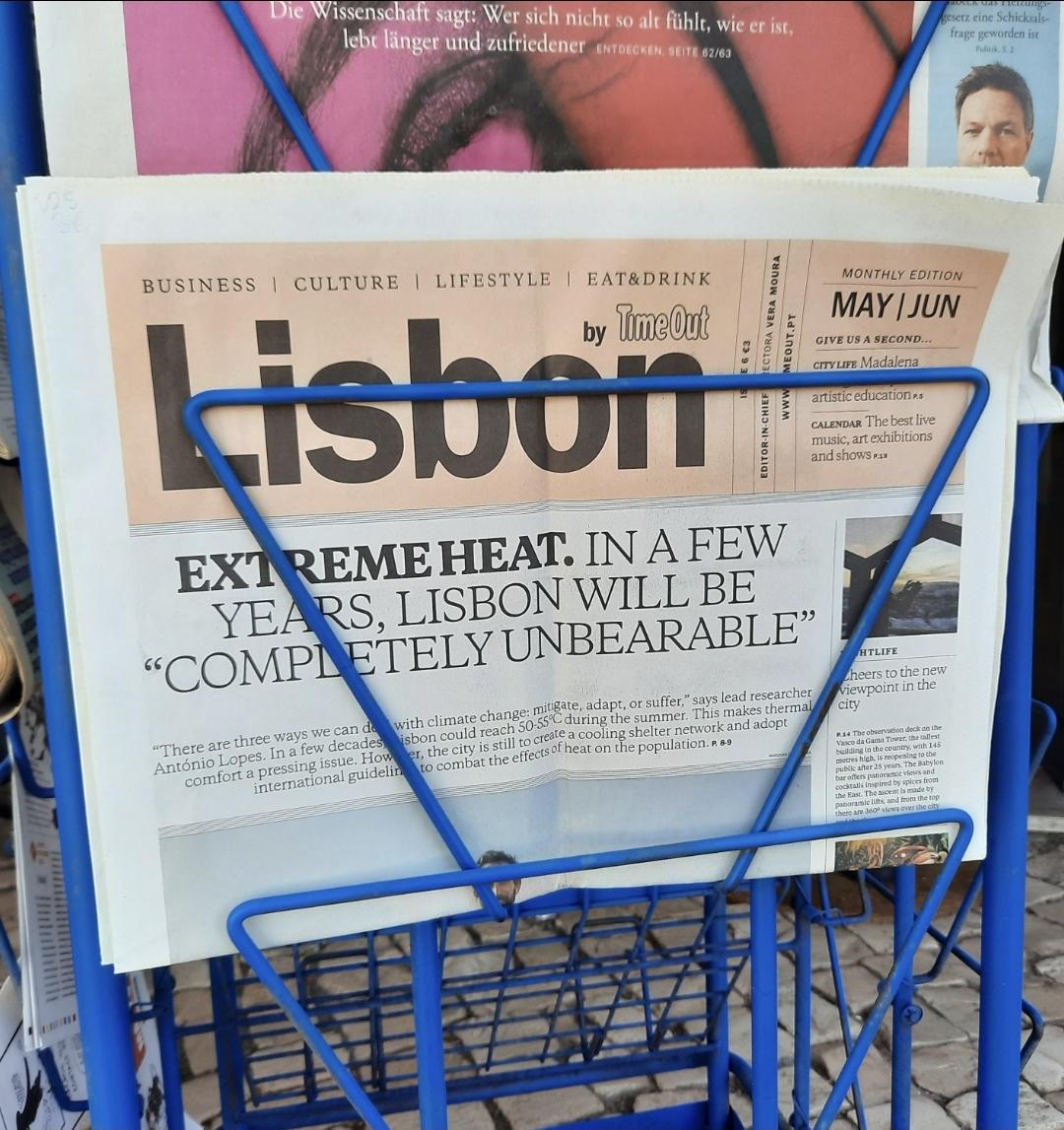 Newspaper with headline about extreme heat and that lisbon will be completey unbearable in a few years